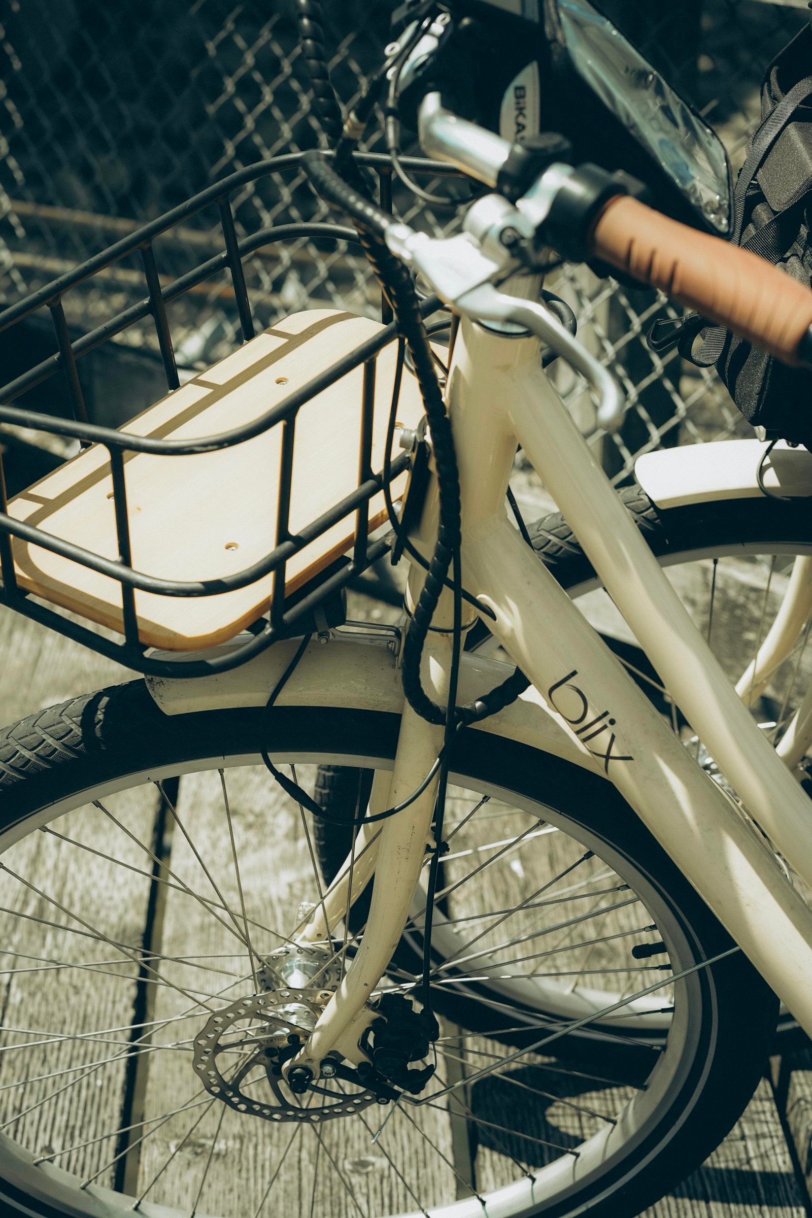 A vintage-style bicycle with a basket, ideal for leisurely rides and local trips.